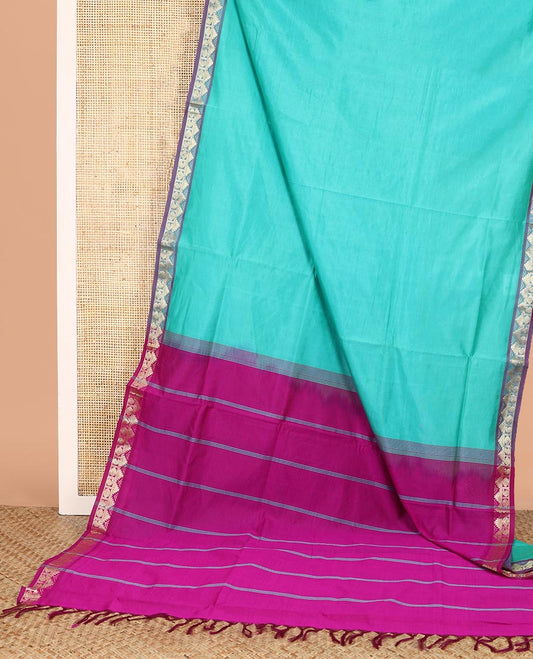 Blue Plain Poly Cotton Saree, Complemented by a Contrast Traditional Zari Temple Border, Pallu of Stripes, and Paired with a Contrast Blouse