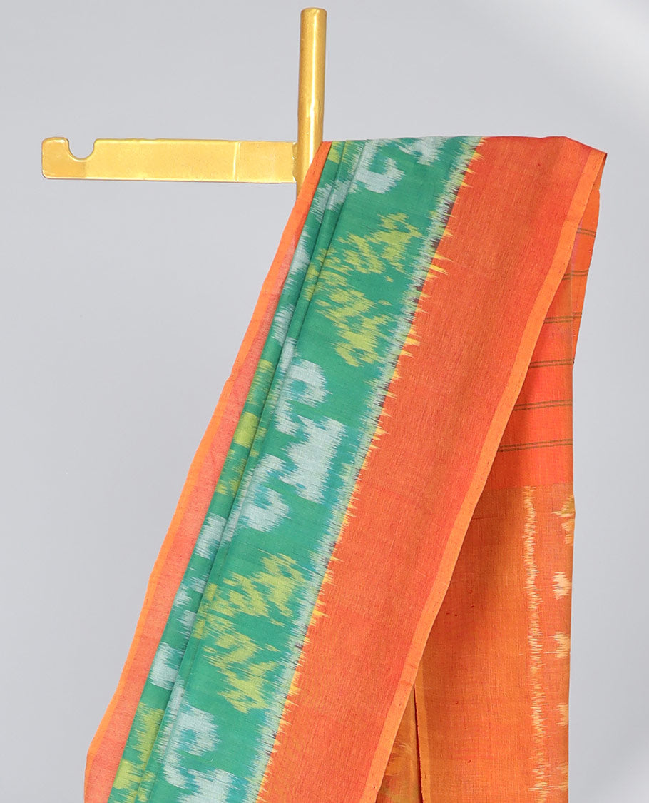 Green argyle design ikkat cotton saree with contrast plain border & intricate design pallu