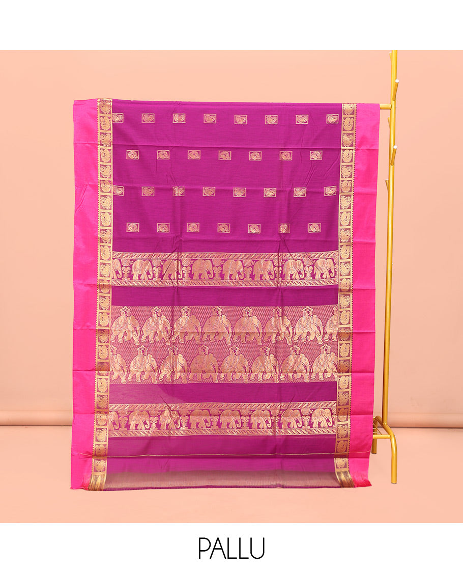 Rani Pink Semi-Silk Cotton Saree, Woven with Zari Buttas All Over Its Body, Complemented by a Contrast Kal Eragina Border of Peacock Designs, Pallu Steeped with Elephant Zari Motifs, and Paired with a Matching Blouse