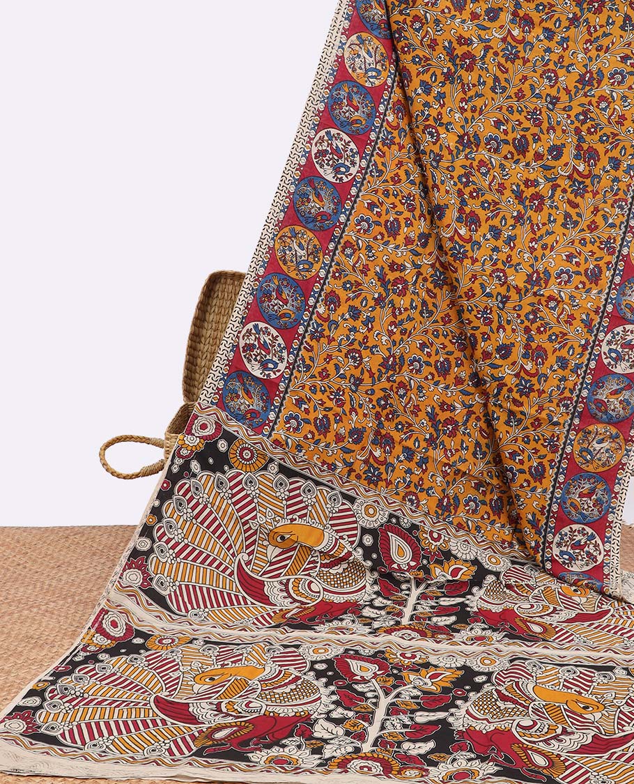 Yellow floral vine design machine printed kalamkari cotton saree with contrast floral border & pallu of peacock design
