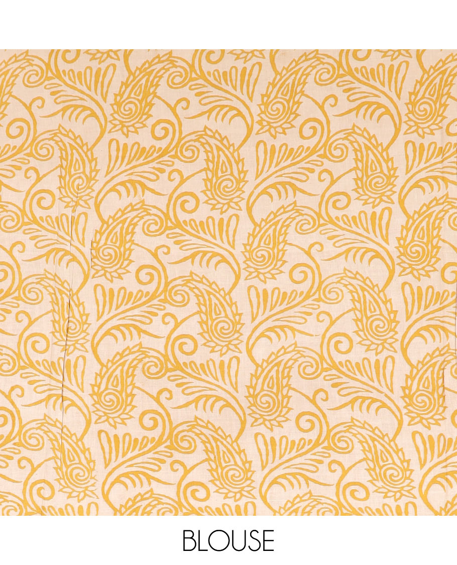 Yellow floral and bird machine-printed cotton saree, contrast floral printed border, and pallu of kalamkari peacock print