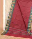 Red micro checked Chettinad cotton saree, contrast temple border, and striped pallu