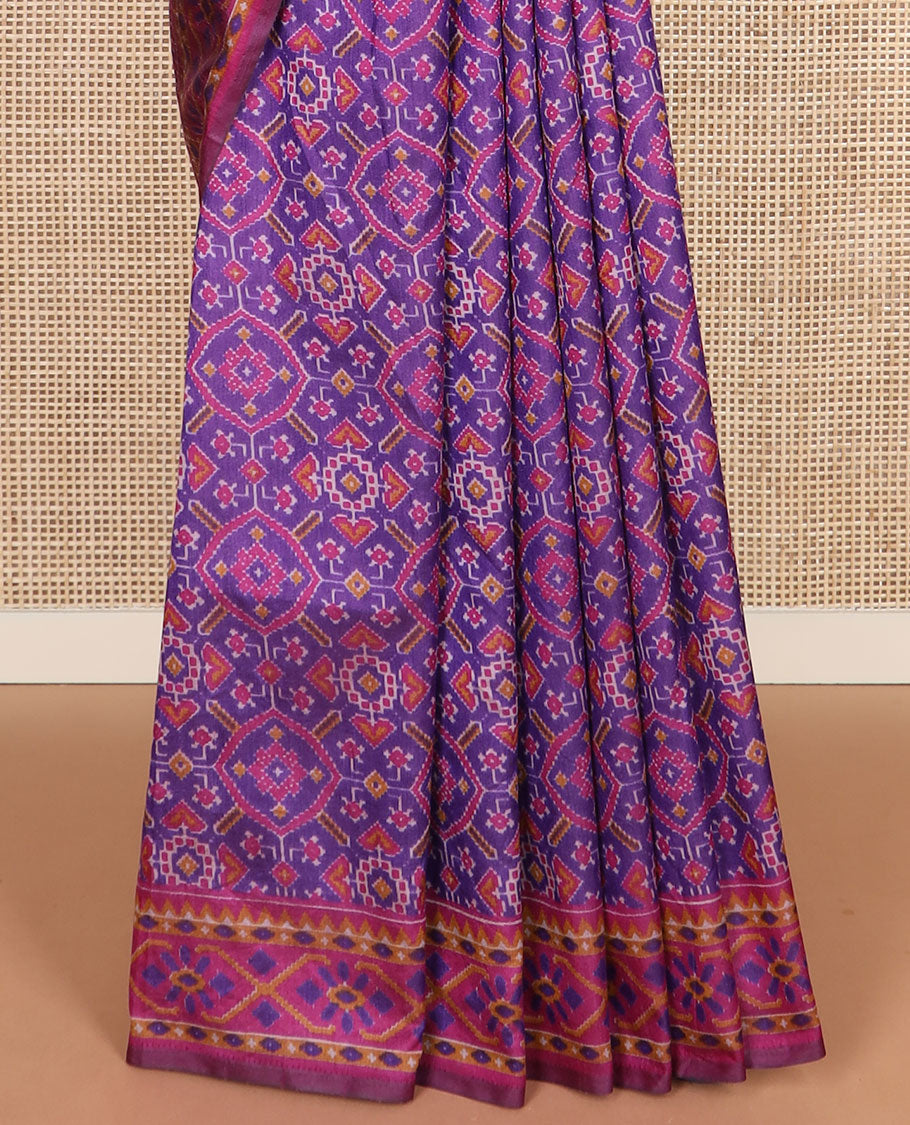 Violet intricately ikkat woven semi-banaras patola silk saree, diamond patterned border, and diamond patterned pallu