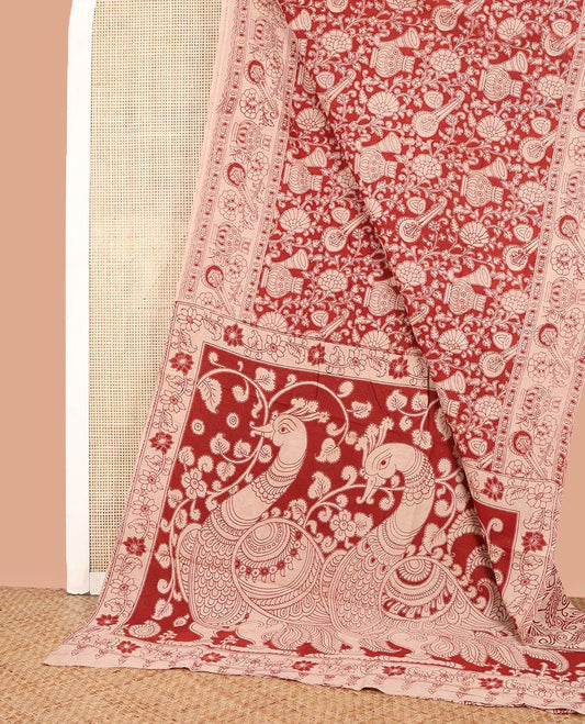 Red Machine-Printed Kalamkari Cotton Saree, Adorned with Musical Instruments and Floral Prints on Its Body, Contrast Printed Border, Pallu of Kalamkari Peacock Print, and Paired with a Printed Blouse