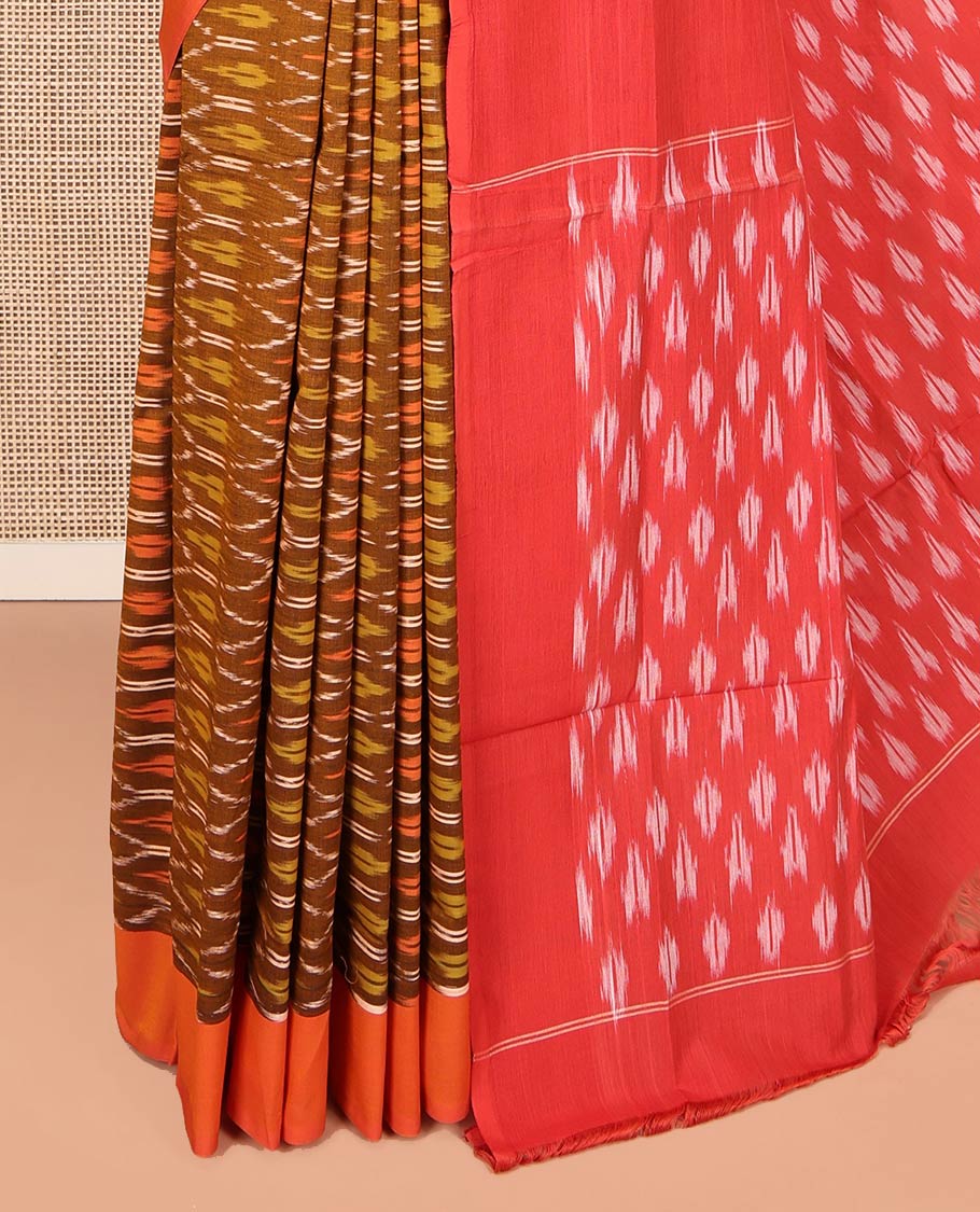 Brown Ikkat Cotton Saree, Decked Up with Ikkat-Style Ogee Patterns on Its Body, Complemented by Contrast Plain Border, Pallu Steeped with Ikkat Buttas, and Has No Blouse