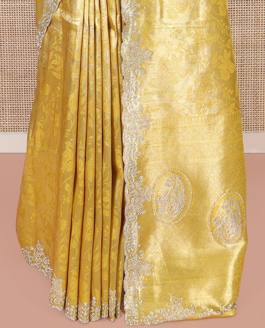 Yellow Designer Saree, Enriched with Floral Jaal Jacquard on Its Body, Highlighted by a Scallop Stone Embroidered Border, Majestically Detailed Pallu, and Paired with a Matching Blouse