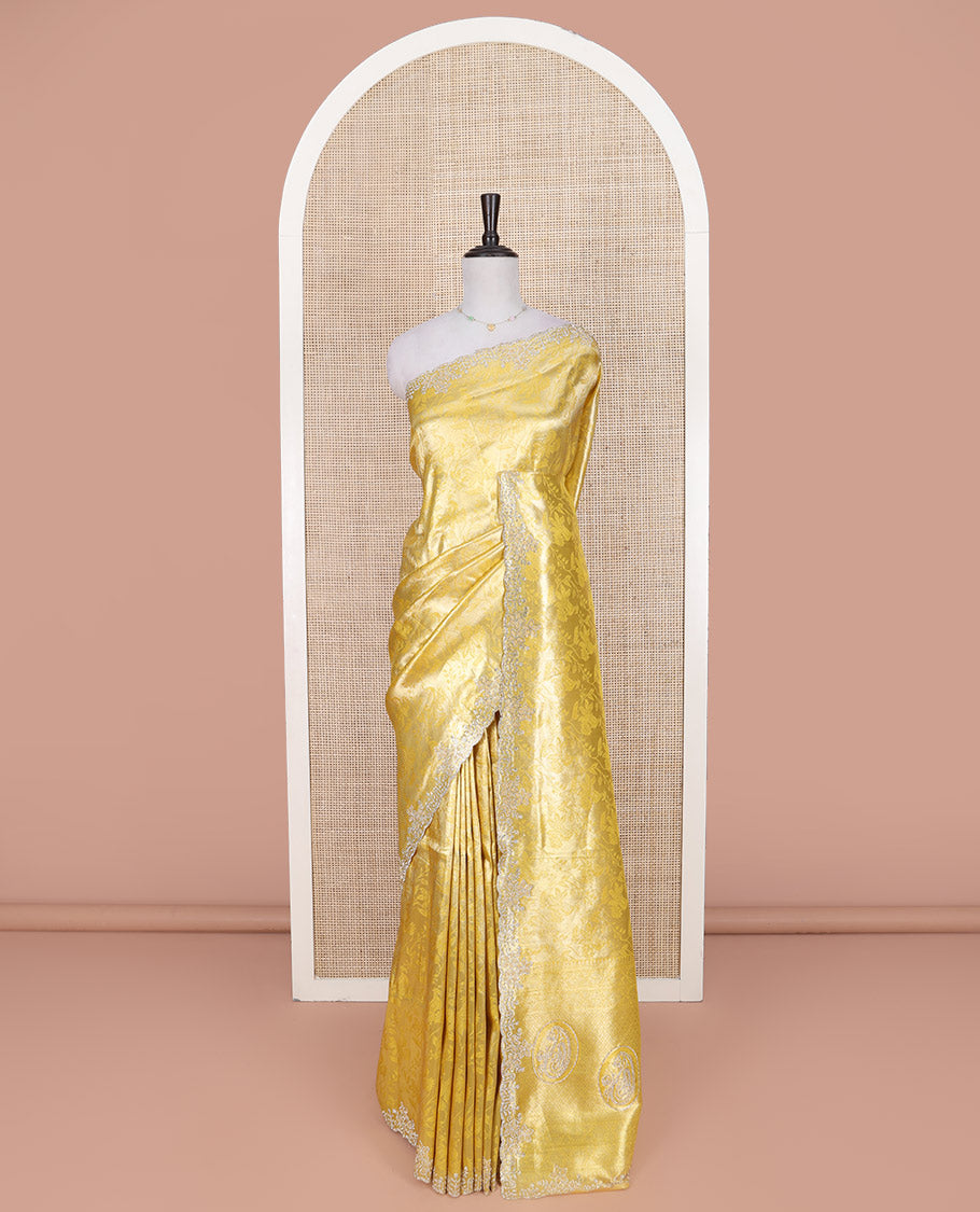 Yellow Designer Saree, Enriched with Floral Jaal Jacquard on Its Body, Highlighted by a Scallop Stone Embroidered Border, Majestically Detailed Pallu, and Paired with a Matching Blouse