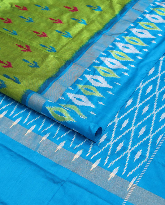 Green ikkat saree with ikkat buttas, contrast ikkat border & pallu of ikkat jaal design