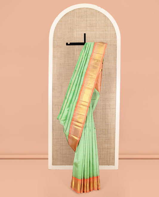 Pista Green Kanchipuram Silk Saree, Woven with Zari Buttas, Contrast One-Sided Border of Panner Sombu, Banaras, Muthu, and Jaal Designs, Zari Design Pallu, and No Blouse