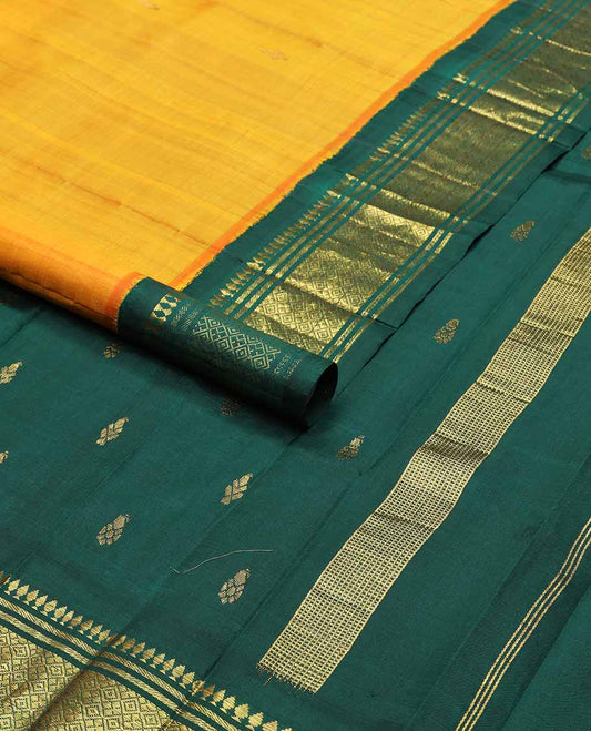 Orange floral buttas kancheepuram silk saree with contrast korvai border of rekku, banaras, kuyil kann design & zari design pallu