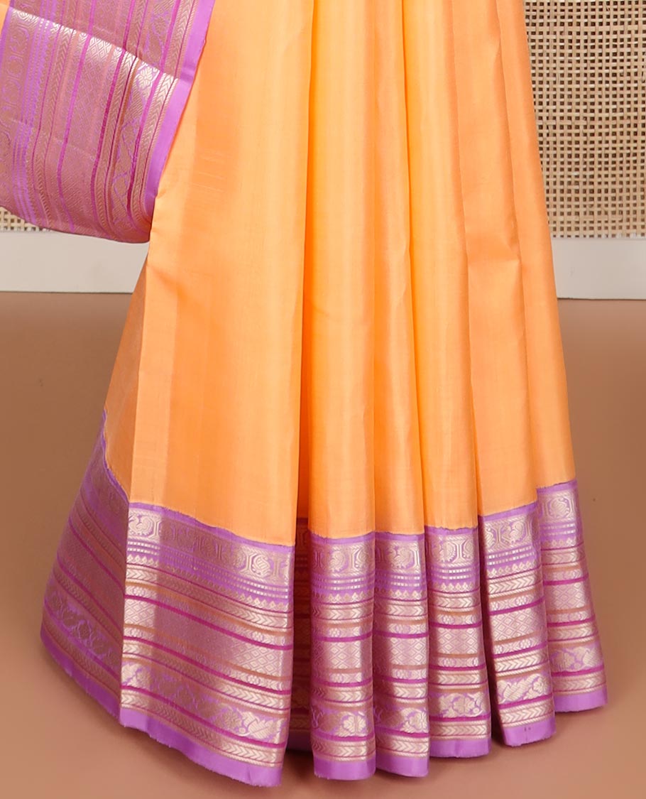 Orange buttas kancheepuram silk saree with contrast intricate zari design border & floral design pallu