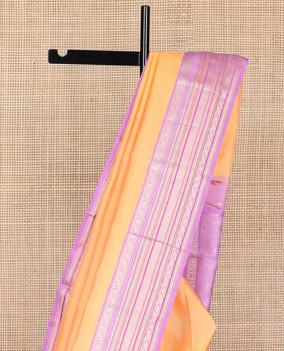 Orange buttas kancheepuram silk saree with contrast intricate zari design border & floral design pallu