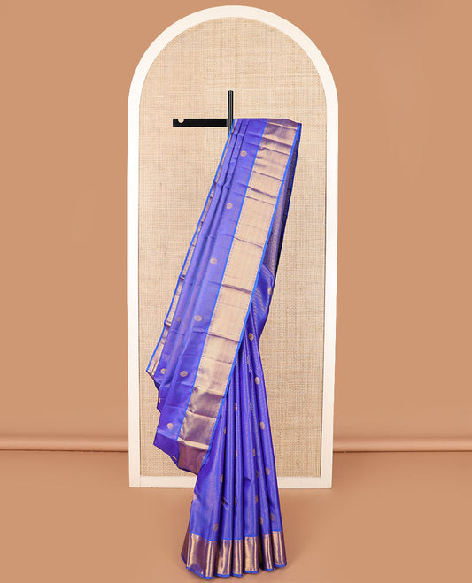 Blue mayil chakram buttas Kanchipuram silk saree, zari border of rudraksham and diamond designs, and intricate pallu