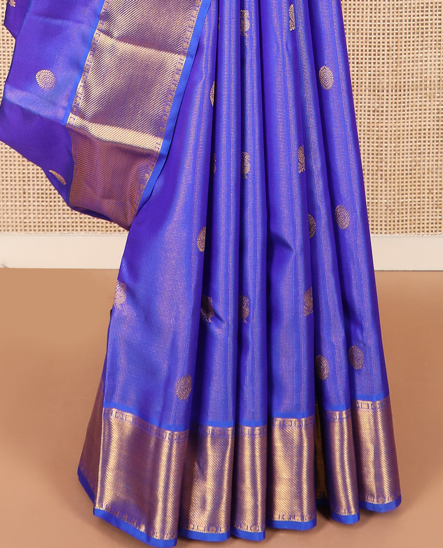 Blue mayil chakram buttas Kanchipuram silk saree, zari border of rudraksham and diamond designs, and intricate pallu
