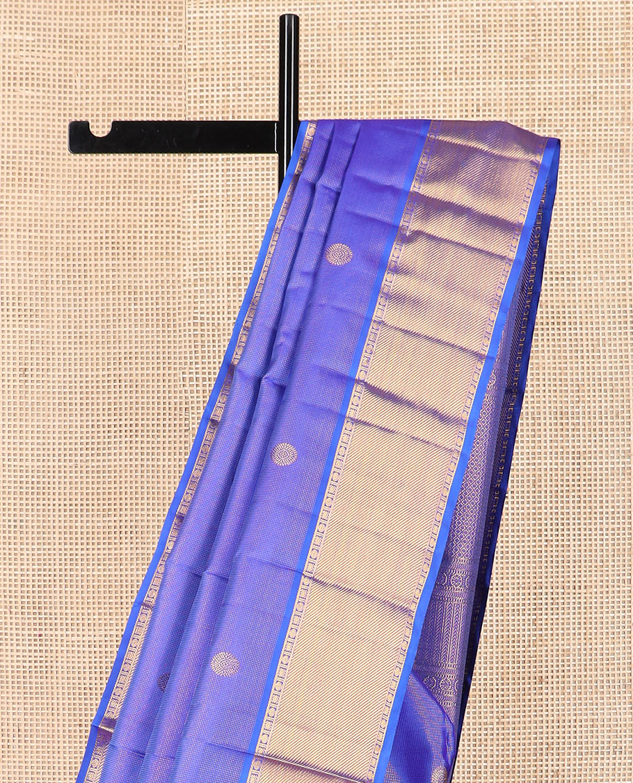 Blue mayil chakram buttas Kanchipuram silk saree, zari border of rudraksham and diamond designs, and intricate pallu