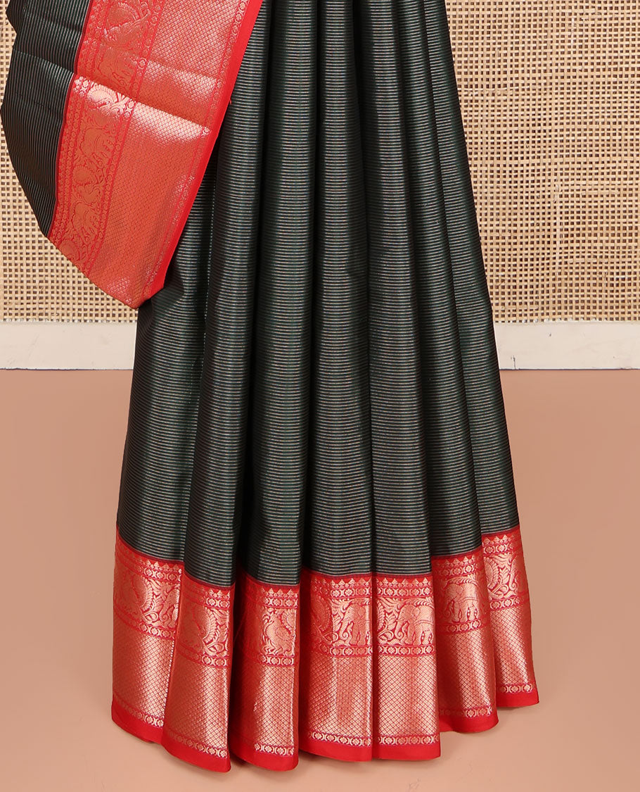 Green Kanchipuram Silk Saree, Bedecked with Stripes All Over Its Body, Complemented by Contrast Border of Mayil, Yaanai, Kamalam, and Mayil Kann Designs, Gleaming Zari-Striped Pallu, and Paired with a Contrast Blouse