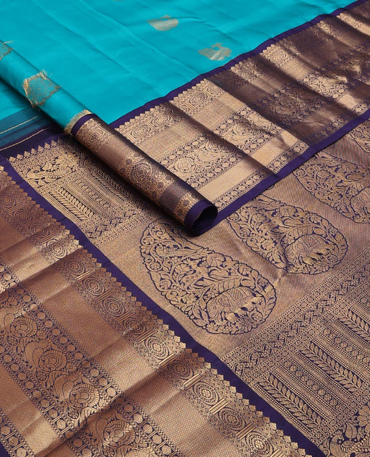 Blue zari buttas silk saree, contrast border of thilakam mokku,rettai neli,chakram,mayil kann, rudraksham & mayil & intricate pallu