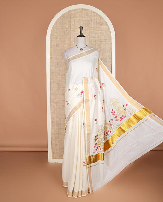Cream floral motifs embroidered Kerala cotton saree, zari border, and floral embroidered pallu