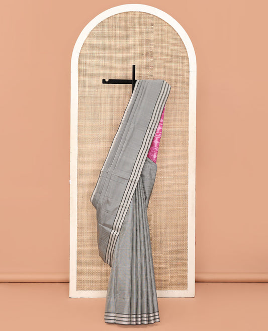 White and Black Mayuri Soft Silk Saree, Subtly Sparkled with Kasa-Kasa Checks All Over Its Body, Highlighted by Zari Striped Border, Delicately Woven Pallu of Ikkat Texture, and Paired with a Contrast Blouse