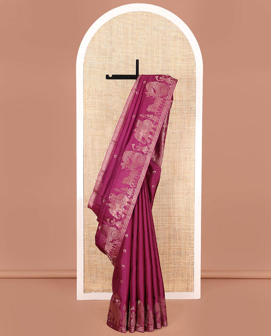 Purple Mayuri Soft Silk Saree, Richly Detailed with Ring Buttas All Over Its Body, Highlighted by a Zari Border of Wedding-Style Bride and Groom Motifs Weave, Sparsely Woven Pallu with Wedding-Related Motifs, and Paired with a Matching Blouse
