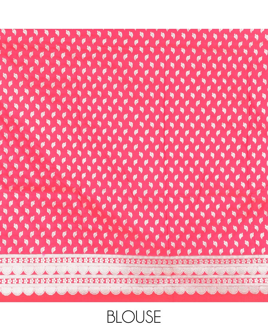 Pink plain mushru silk saree, self-border of scallop design, floral, and tree motifs, and intricately designed pallu