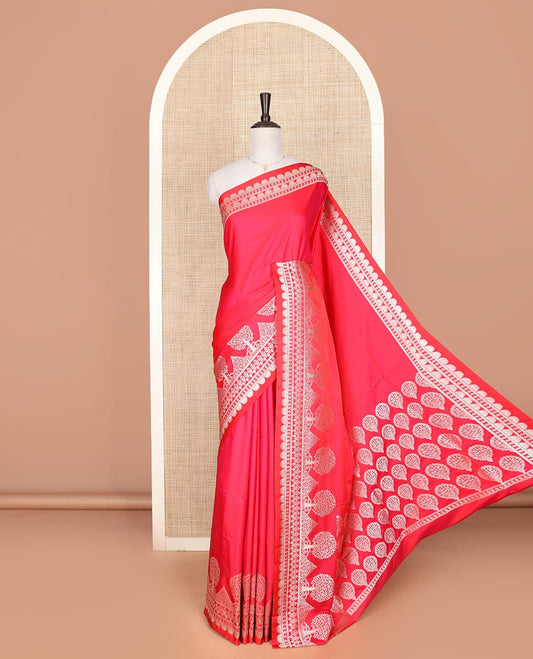 Pink plain mushru silk saree, self-border of scallop design, floral, and tree motifs, and intricately designed pallu