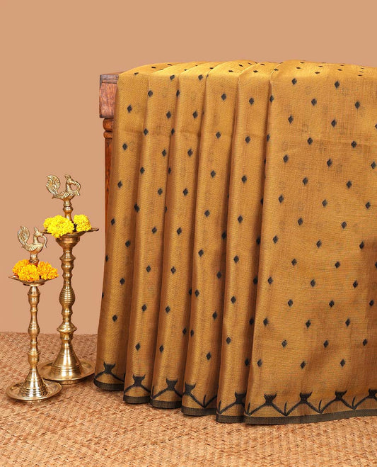 Gold small butta linen tissue saree with zig zag tample border & rich thread weaving pallu pallu along with butta design blouse