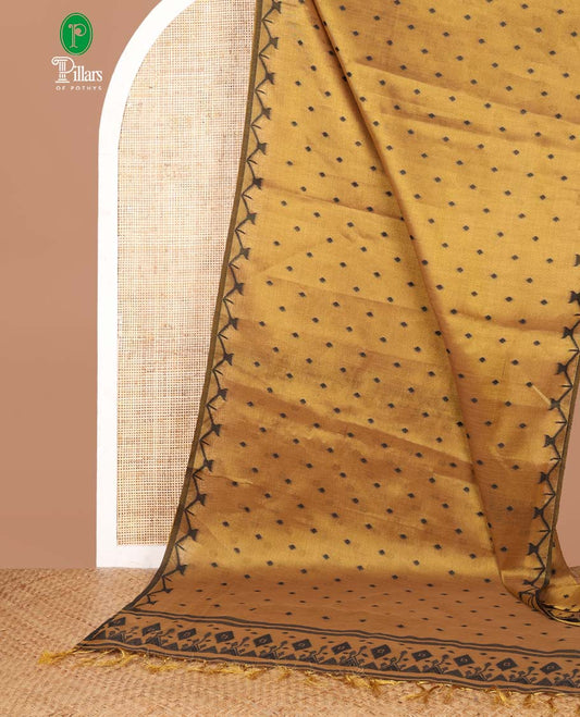 Gold small butta linen tissue saree with zig zag tample border & rich thread weaving pallu pallu along with butta design blouse
