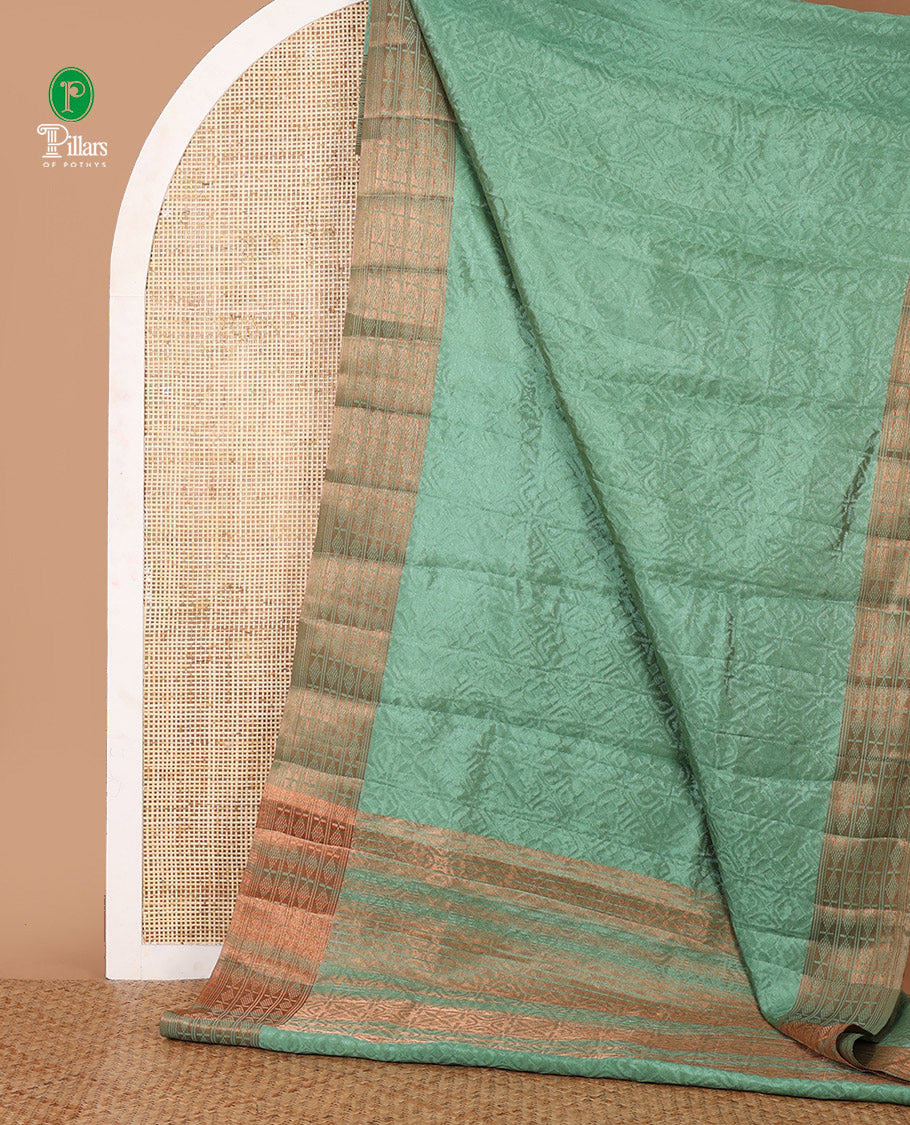 Green embossed thread weave art tussar saree, copper zari border & pallu of intricate designs