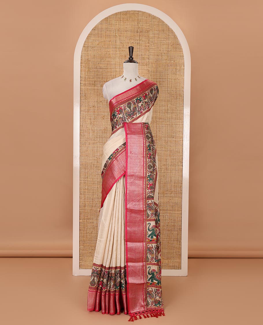 Chikku zari striped & printed dola silk saree, contrast rani pink traditional zari border & pallu of elephant & peacock print & contrast printed blouse