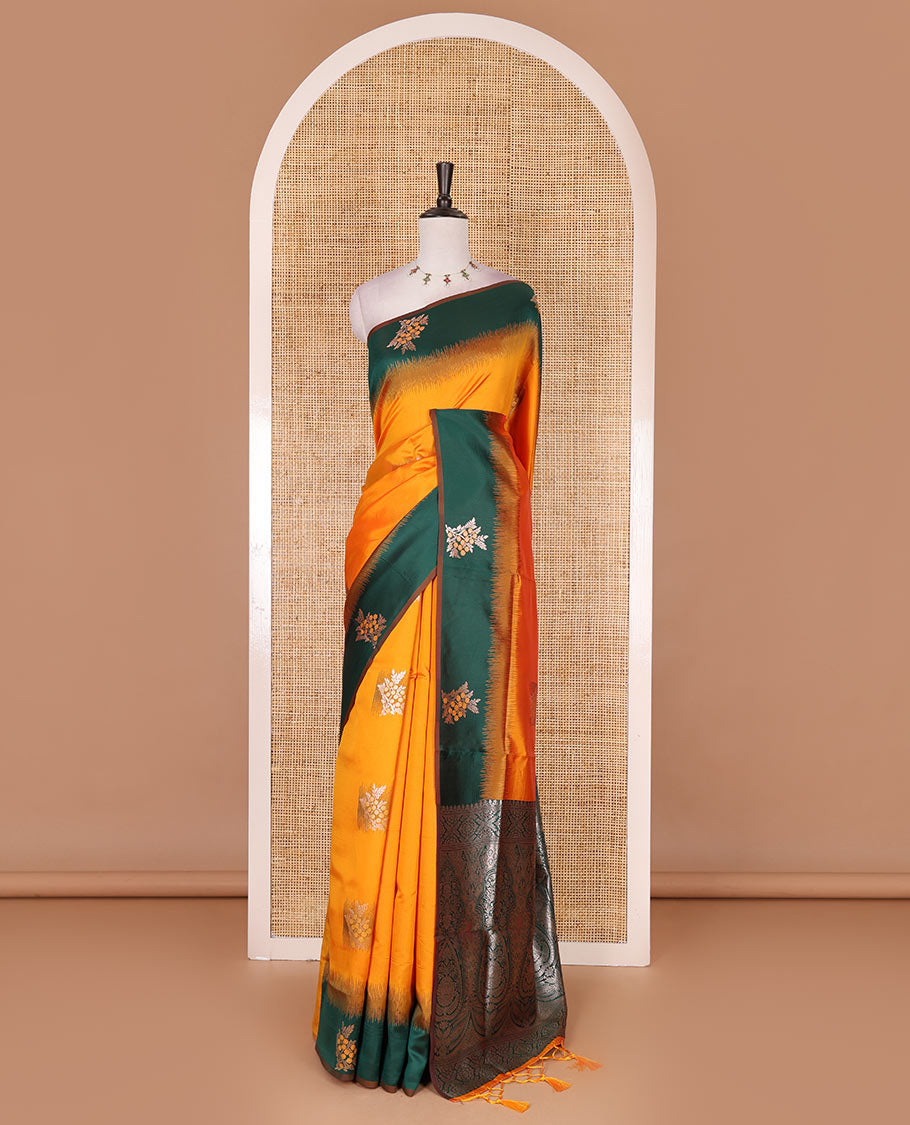 Yellow-green floral buttas elite soft silk saree, contrast floral buttas border, and pallu of Mughal-style intricate zari designs