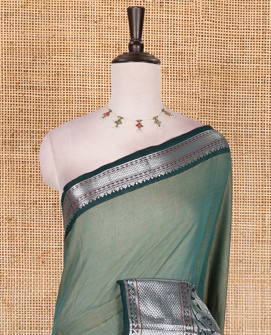 Green plain mercerised cotton saree, contrast traditional zari border of elephant and peacock designs, striped pallu, and plain blouse
