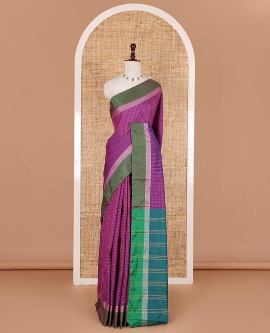 Purple-mehendi green plus-shaped buttas steeped semi-soft silk saree, contrast satin border of stripes, striped pallu, and contrast blouse