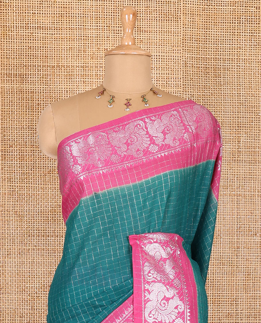 Rama checked sungudi cotton saree, contrast silver zari peacock motif border, striped pallu, and a contrast checked blouse