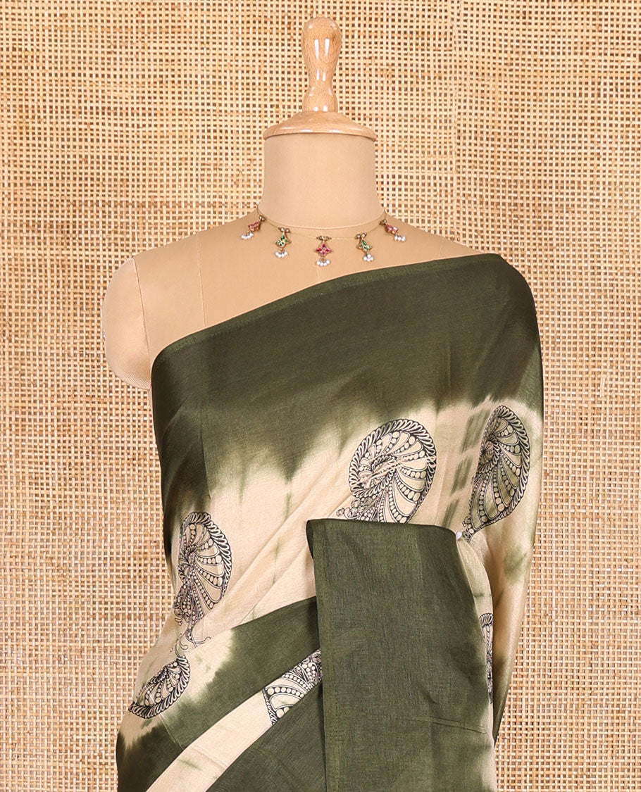 Borderless green shibori printed with shell motifs, blockprinted Manipur tussar saree, shibori printed pallu, and a plain matching blouse