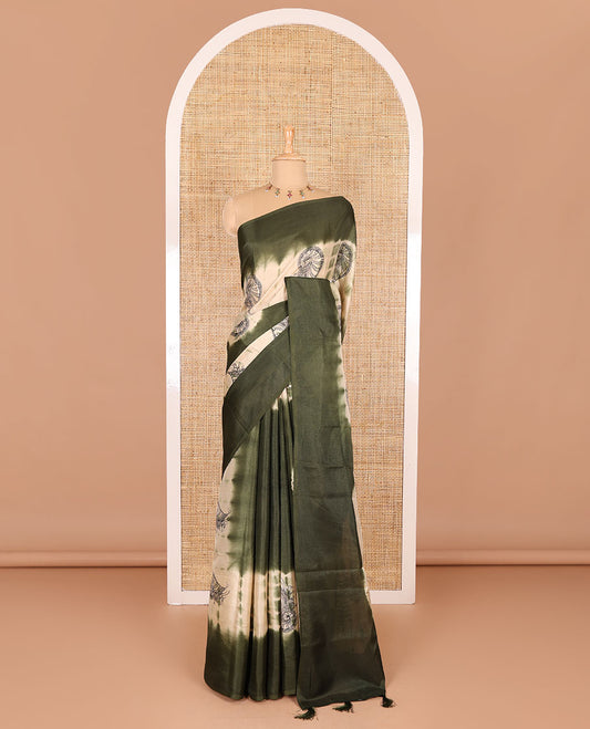 Borderless green shibori printed with shell motifs, blockprinted Manipur tussar saree, shibori printed pallu, and a plain matching blouse