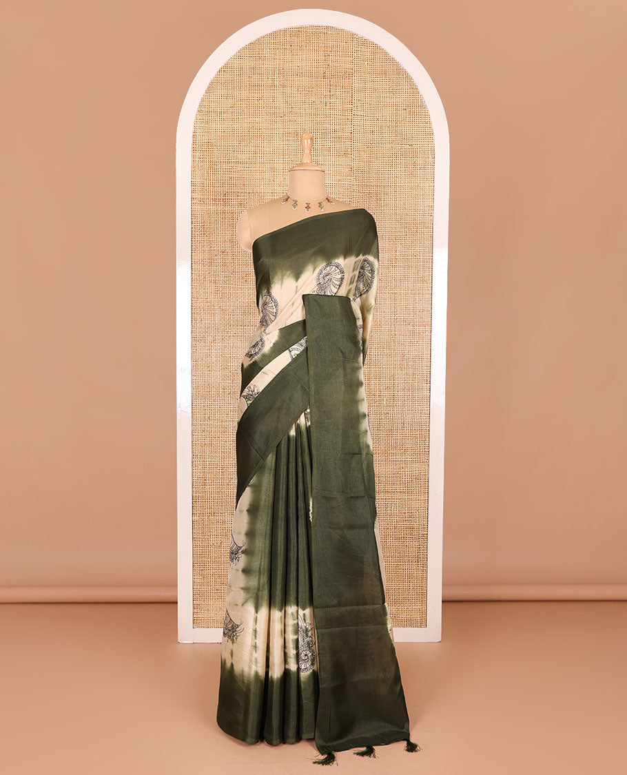 Borderless green shibori printed with shell motifs, blockprinted Manipur tussar saree, shibori printed pallu, and a plain matching blouse