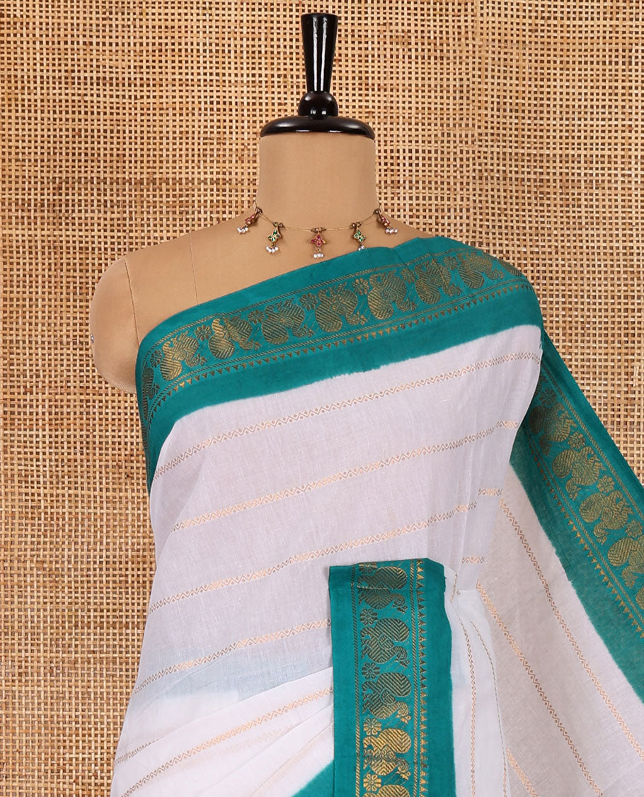Half-white and rama Veldhari striped Sungudi cotton saree, contrast traditional border of peacock buttas, zari striped pallu, and a contrast blouse