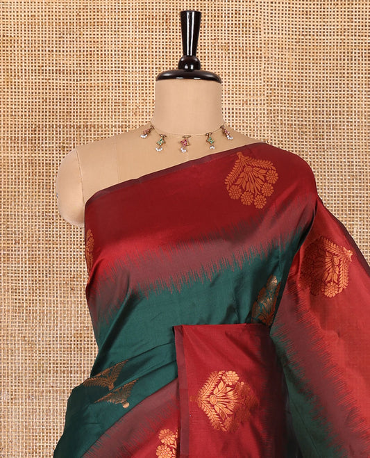 Green floral zari buttas Kanchi silk saree, contrast floral motifs zari woven border, butta enclosed jaal pallu, and a zari design pallu