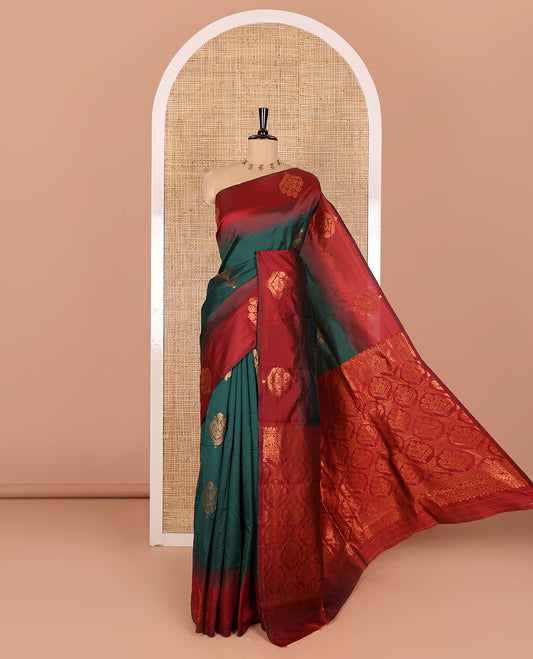 Green floral zari buttas Kanchi silk saree, contrast floral motifs zari woven border, butta enclosed jaal pallu, and a zari design pallu