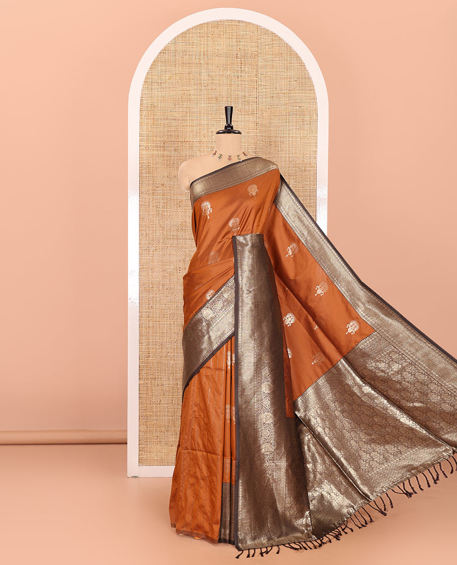 Rust orange zari buttas kanchi soft-silk saree, contrast traditional zari design border, intricate Mughal-style pallu, and a contrast zari design blouse