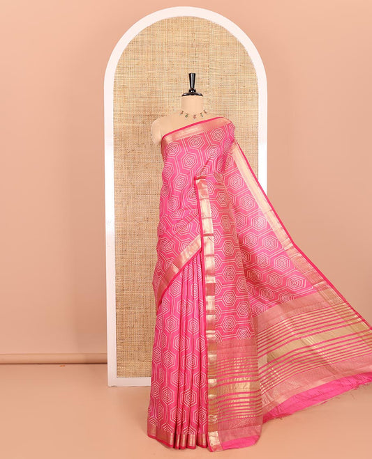 Pink Semi-Tussar Saree Subtly Sparked with Hexagonal Geometric Patterns Printed All Over Its Body, Featuring Traditional Zari Design Border, Gleaming Zari Striped Pallu, and a Matching Blouse