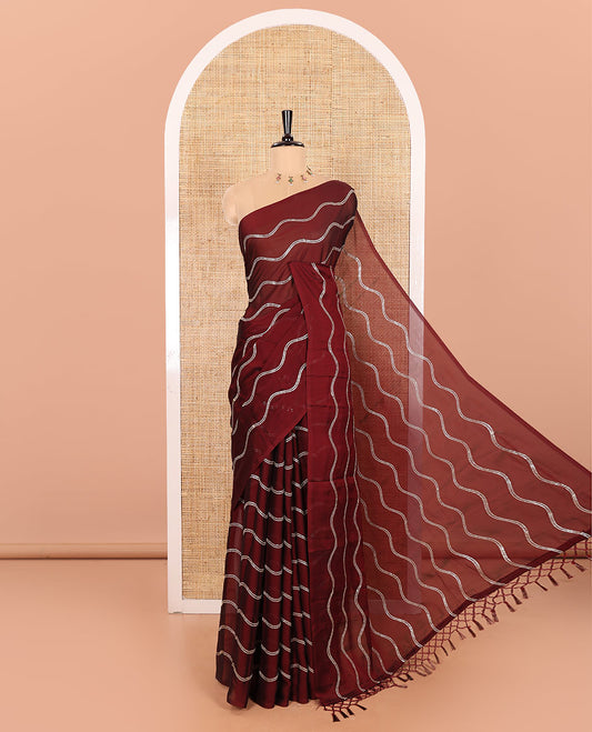 Borderless Maroon Rangoli Chiffon Saree Featuring Sequins-Embroidered Zig-Zag Stripes Woven Across Its Body and Pallu, Comes Without a Blouse