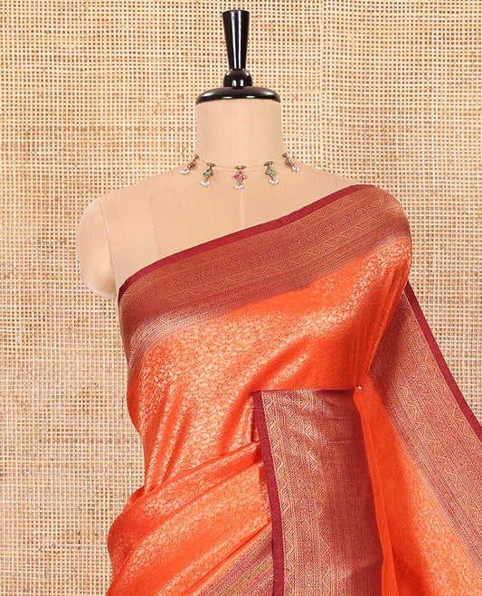Rust Orange Luxury Soft Silk Saree Featuring Leaf Jacquard Design on Its Body, Highlighted with a Contrast Traditional Zari Design Border, Pallu Decked Up with Intricate Designs, and Paired with a Contrast Jacquard Blouse