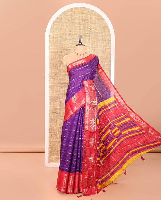 Violet Moss Chiffon Saree Accentuated with Zari Stripes and Temple Designs, Complemented by a Contrast Traditional Zari Border of Parrot Motifs, Pallu Accentuated with Colorful Stripes, and Paired with a Contrast Blouse