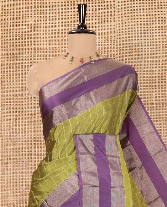 Green Soft Silk Saree, Ornamented with Checked Design on Its Body, Complemented by Contrast Rettai Pettu Border, Subtly Striped Pallu, and Paired with a Matching Blouse