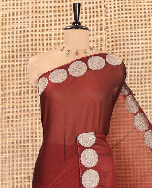 Brown Plain Black Rangoli Saree, Scallop Border Spotlighted by Round Motifs, Patch Embroidery, Self-Pallu, and Paired with a Matching Blouse