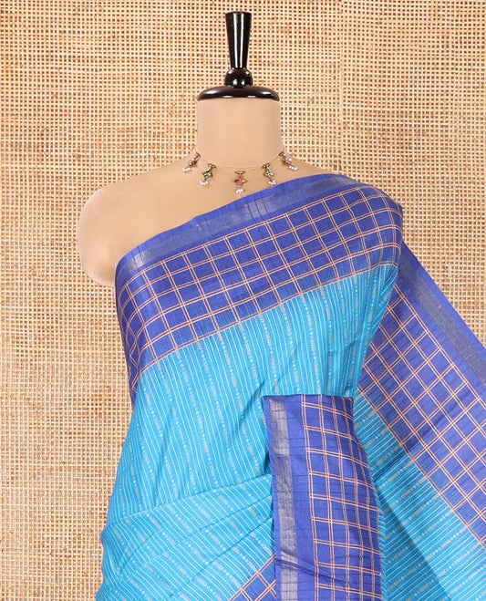 Blue Katan Silk Saree, Adorned with Vaira-Oosai-Style Stripes on Its Body, Complemented by a Contrast-Checked Border, Pallu of Jaal Designs, and Paired with a Contrast Blouse