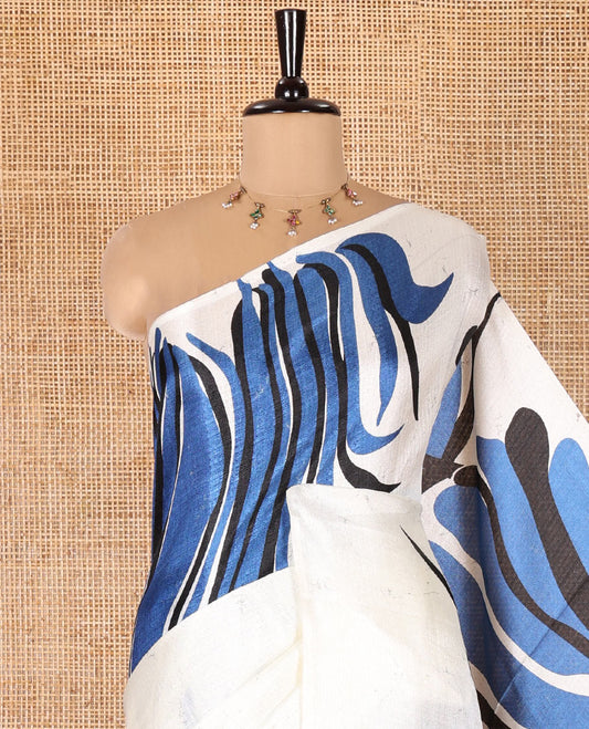Borderless Cream and Blue Art Khadi Cotton Saree, Crafted with Batik Print-Style Vines Print on Its Body, Self-Pallu of Batik Print, and Paired with a Printed Blouse