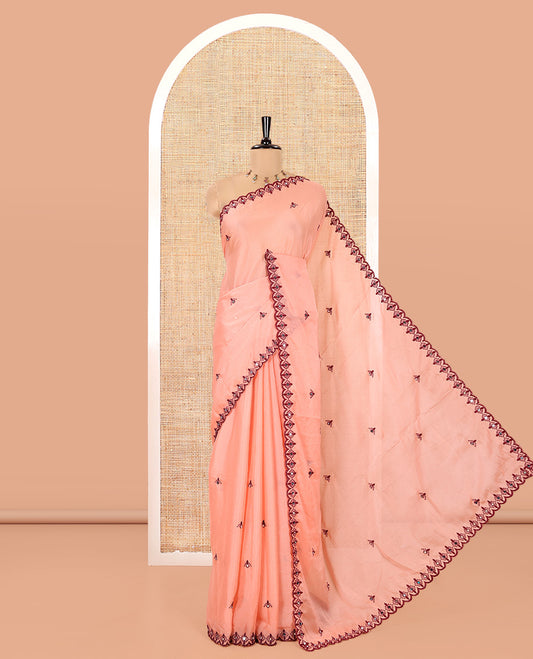 Peach Rangoli Chiffon Saree, Adorned with Thread and Mirror Work Buttas on Its Body, Subtle Scallop Embroidered Border, Embroidered Pallu, and Paired with a Contrast Mirror Work Blouse